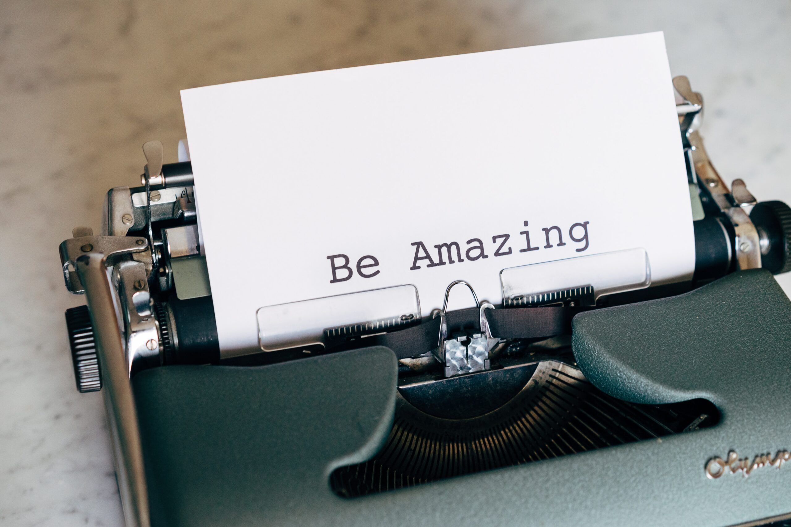 a typewriter writing quotes about affirmations
