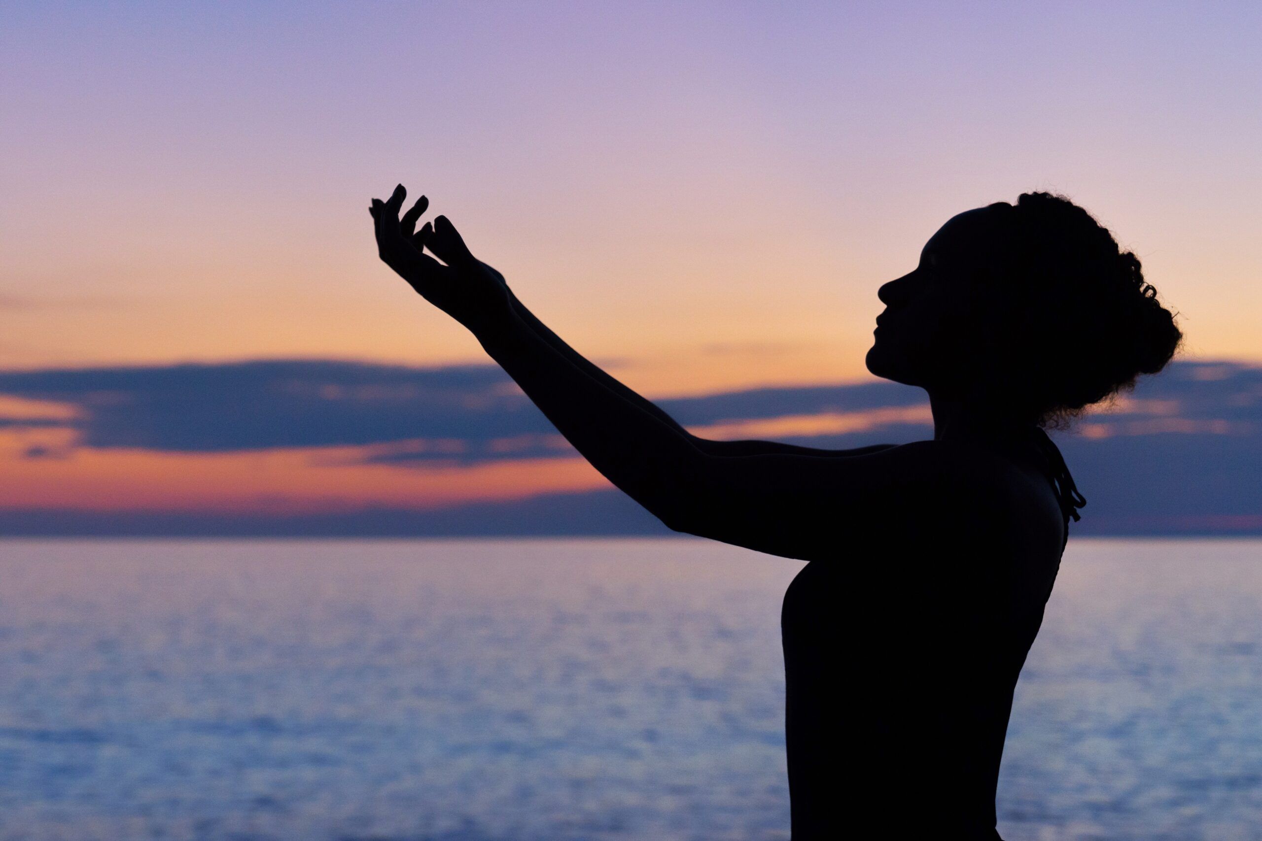 A Woman Practicing Healing Affirmations for Women